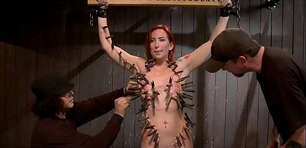  Redhead slave gets whole body clamped